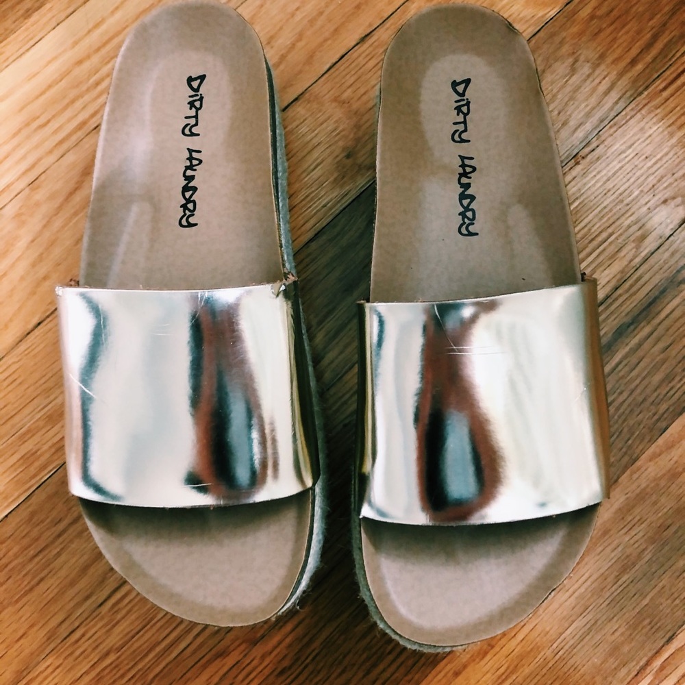 Gold platform sandals.